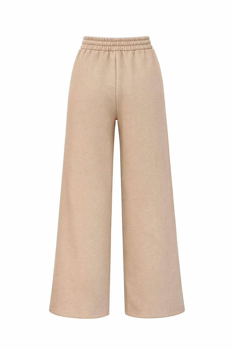 Бежевые брюки на флисе Dixie