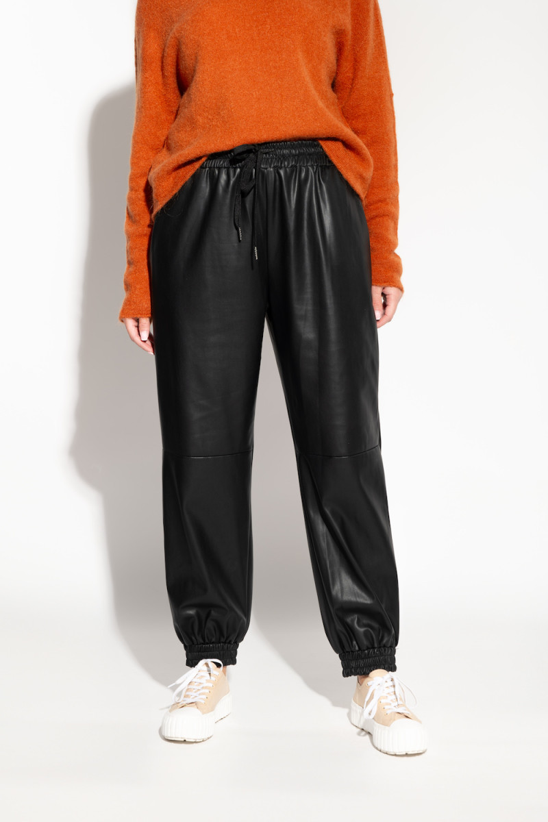 Чёрные брюки джогеры с эко кожи на флисе итальянского бренда Joleen