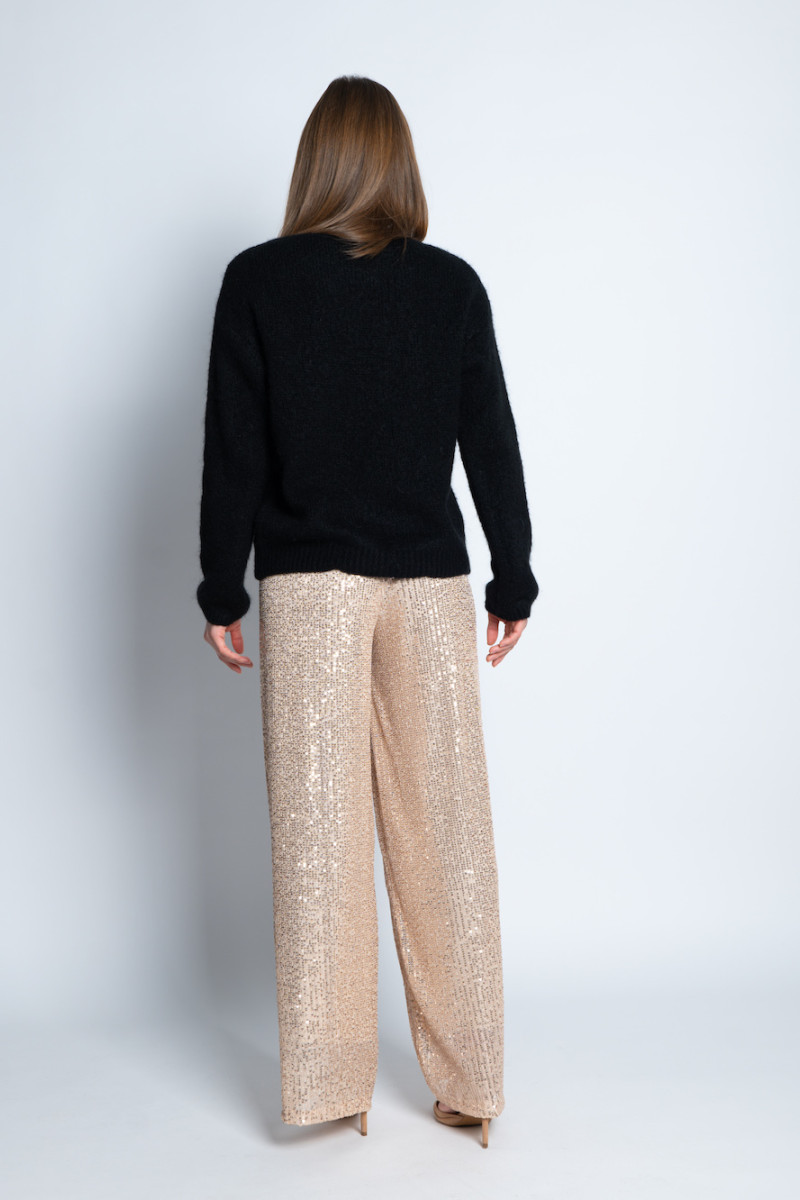 Брюки в пайетках золотого цвета итальянского бренда Dixie