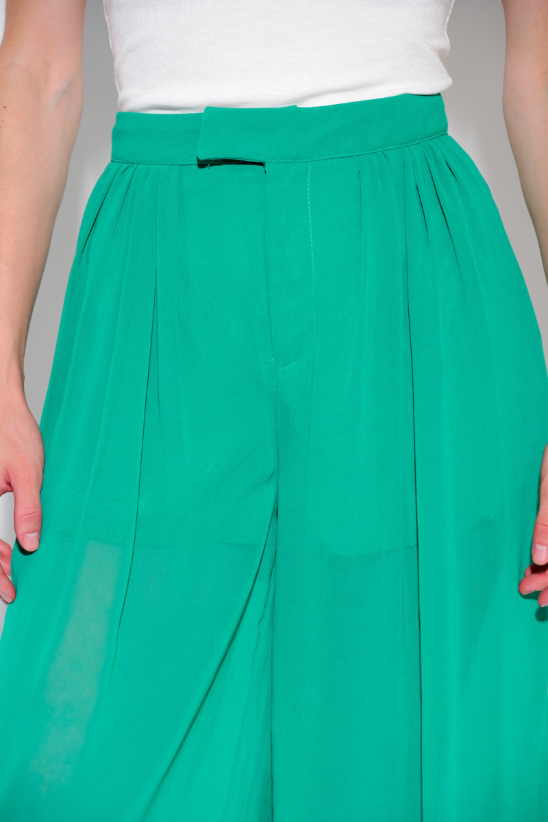 Зелёные полупрозрачные брюки с вшитыми шортами итальянского бренда Motel