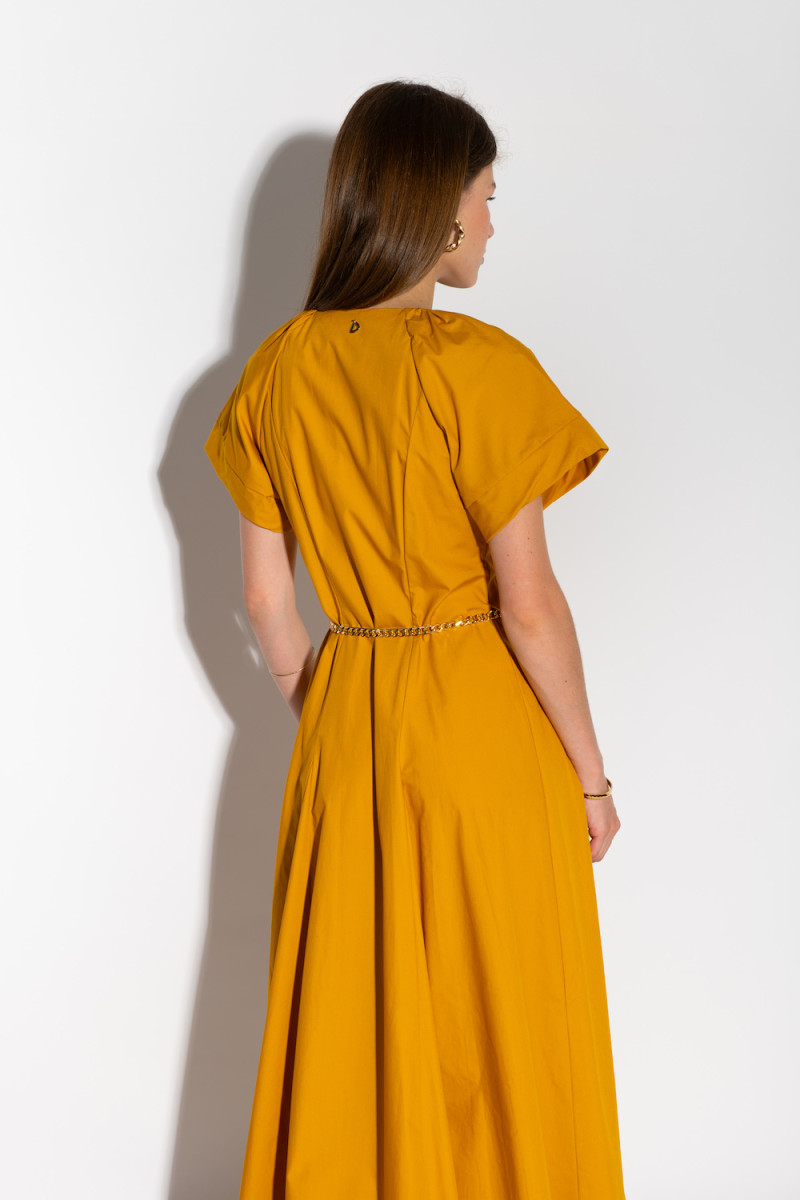 Хлопковое платье длины миди  шафранового цвета итальянского бренда Dixie