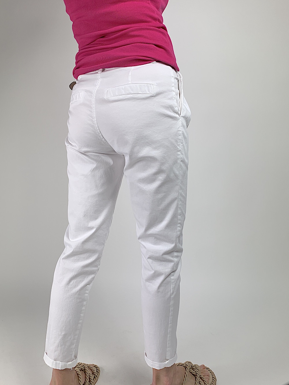 Білі легкі бавовняні брюки італійського бренду Dixie